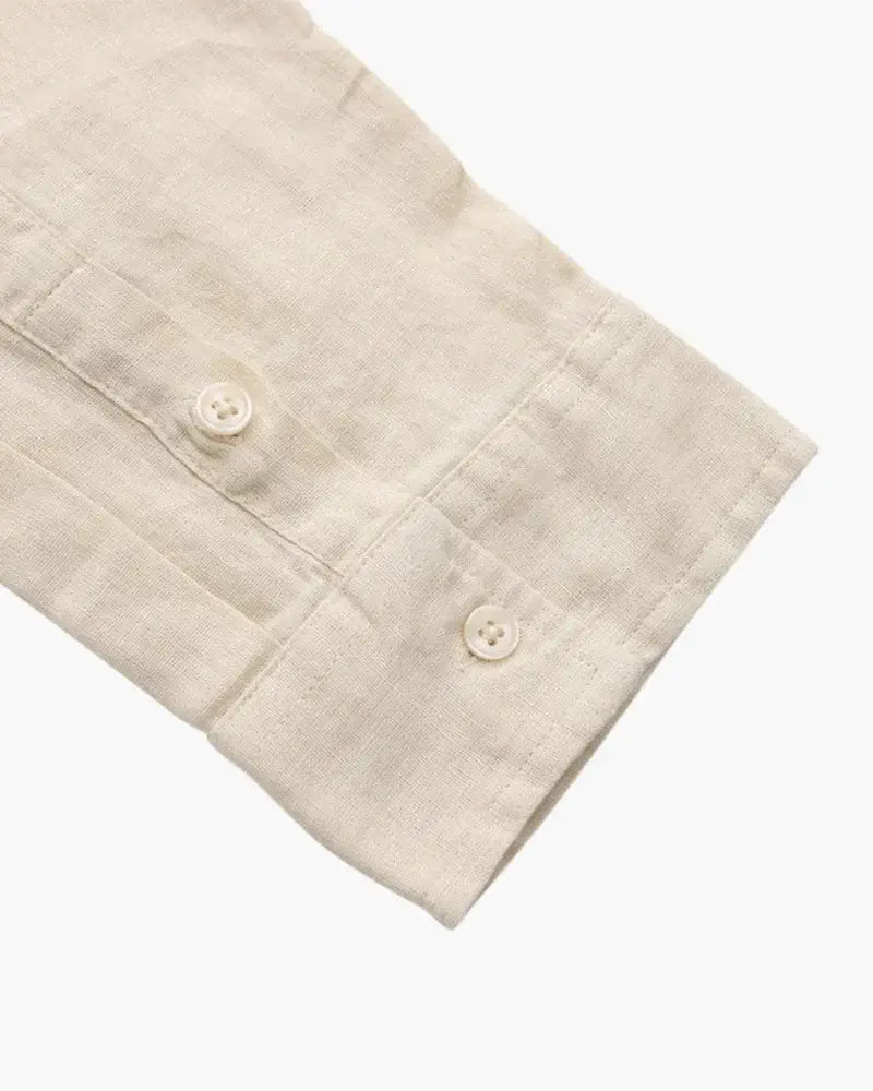 Beige linen shirt by Ilynora, fabric detail highlighting airy weave and soft finish