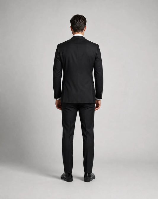 Black slim fit three piece suit back view with tailored fit and formal occasion styling by ILYNORA