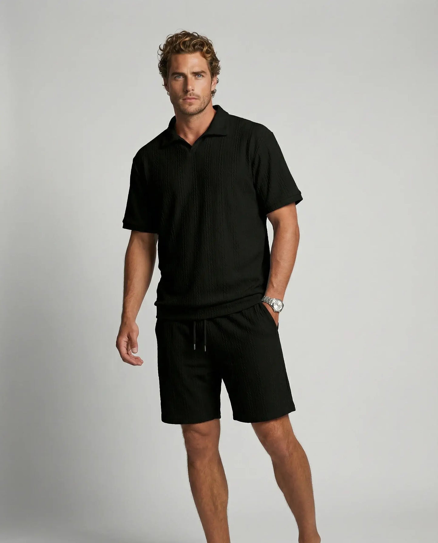 Men's textured zip polo and shorts set in black by Ilynora, front view with clean silhouette and modern look