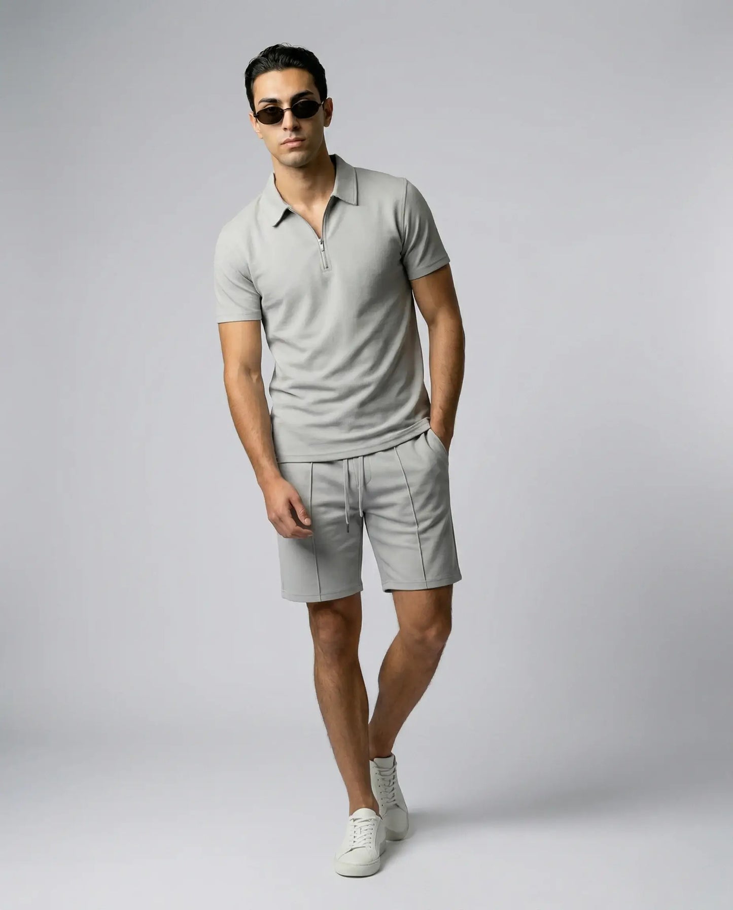 Grey zip polo and shorts set for men by Ilynora, clean matching outfit with modern relaxed fit