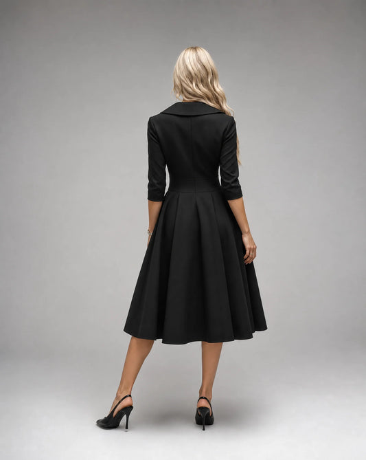 Black satin lapel midi dress for women by Ilynora, back view showcasing the flowing skirt and refined fit