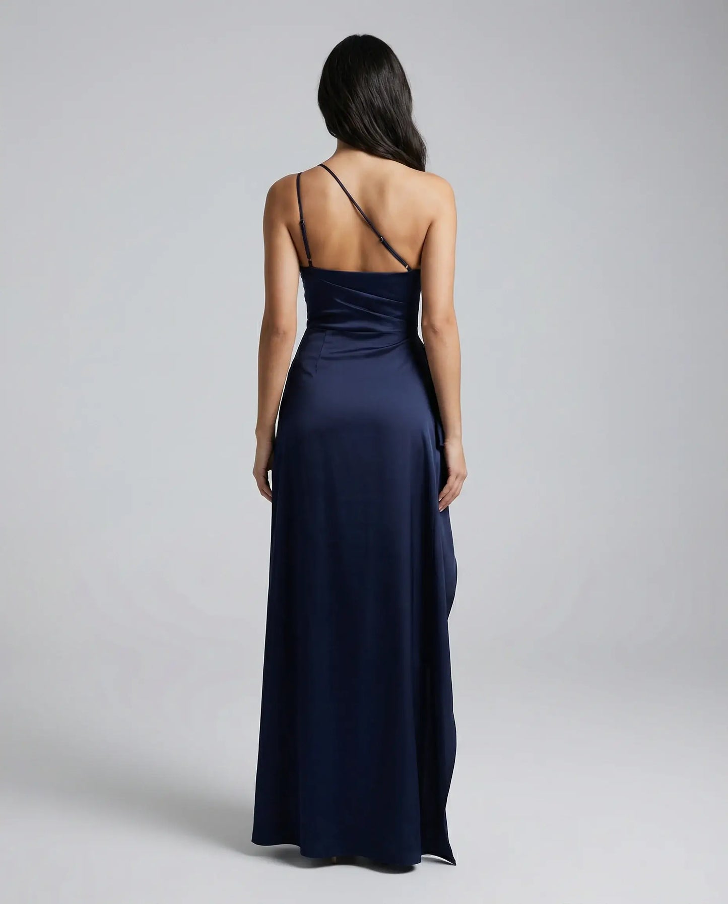 Navy one-shoulder satin maxi dress for women by Ilynora, back view highlighting sleek silhouette and smooth satin drape