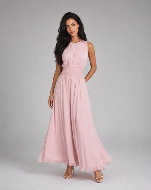 Women's light pink sleeveless chiffon maxi dress with airy fabric and feminine movement by ILYNORA