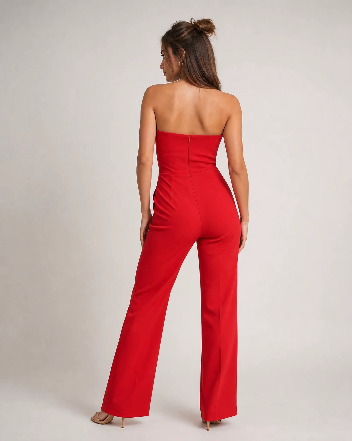 Red strapless wide leg jumpsuit back view with tailored silhouette and elegant evening styling by ILYNORA