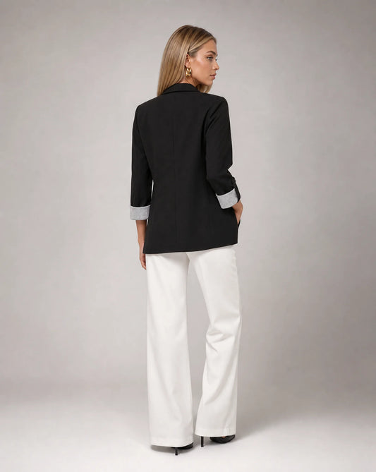 Women's black longline blazer with tailored fit and versatile everyday elegance by ILYNORA