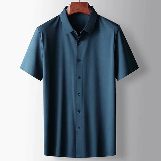 Men's blue lightweight silk blend short sleeve shirt with button front, classic collar and breathable smart casual fit by ILYNORA