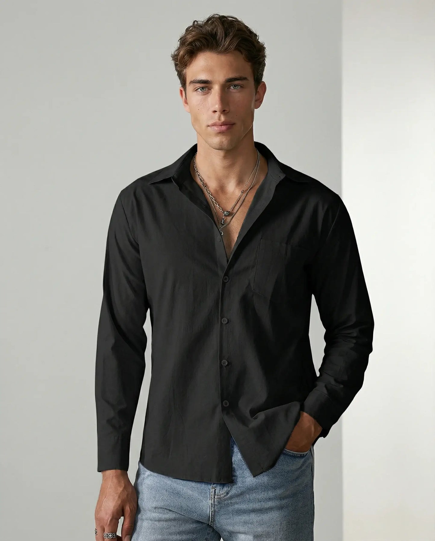 Black linen shirt for men by Ilynora, front view with modern silhouette and breathable comfort