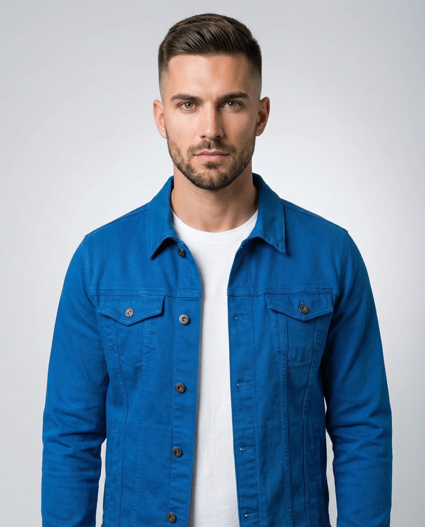 Blue classic trucker denim jacket for men by Ilynora, front view with button closure and chest pockets