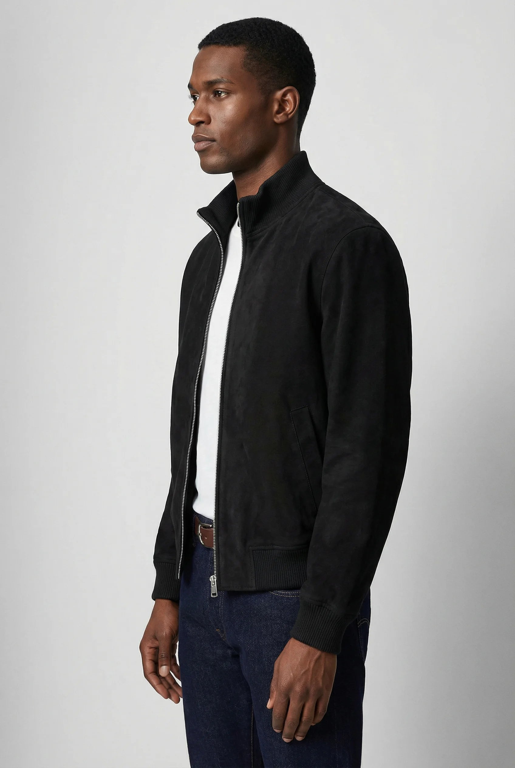 Grey slim fit suede jacket for men by Ilynora, side profile view with zip closure and clean modern fit