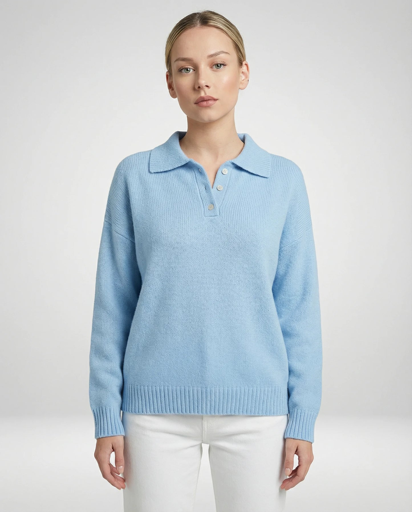 Blue relaxed knit polo sweater for women by Ilynora, front view with soft texture, collar detail and modern minimal fit