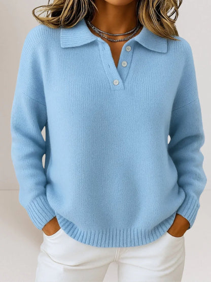 Blue relaxed knit polo sweater for women by Ilynora, close-up view highlighting soft texture, collar detail and relaxed fit