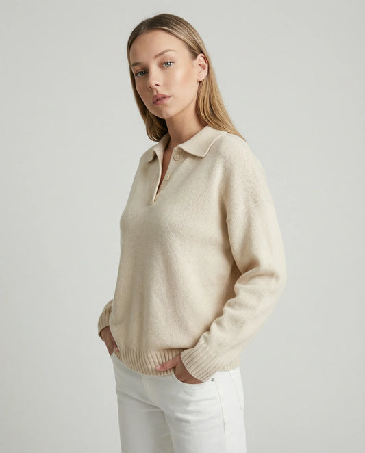 White relaxed knit polo sweater for women by Ilynora, side profile view with soft texture and clean minimalist fit