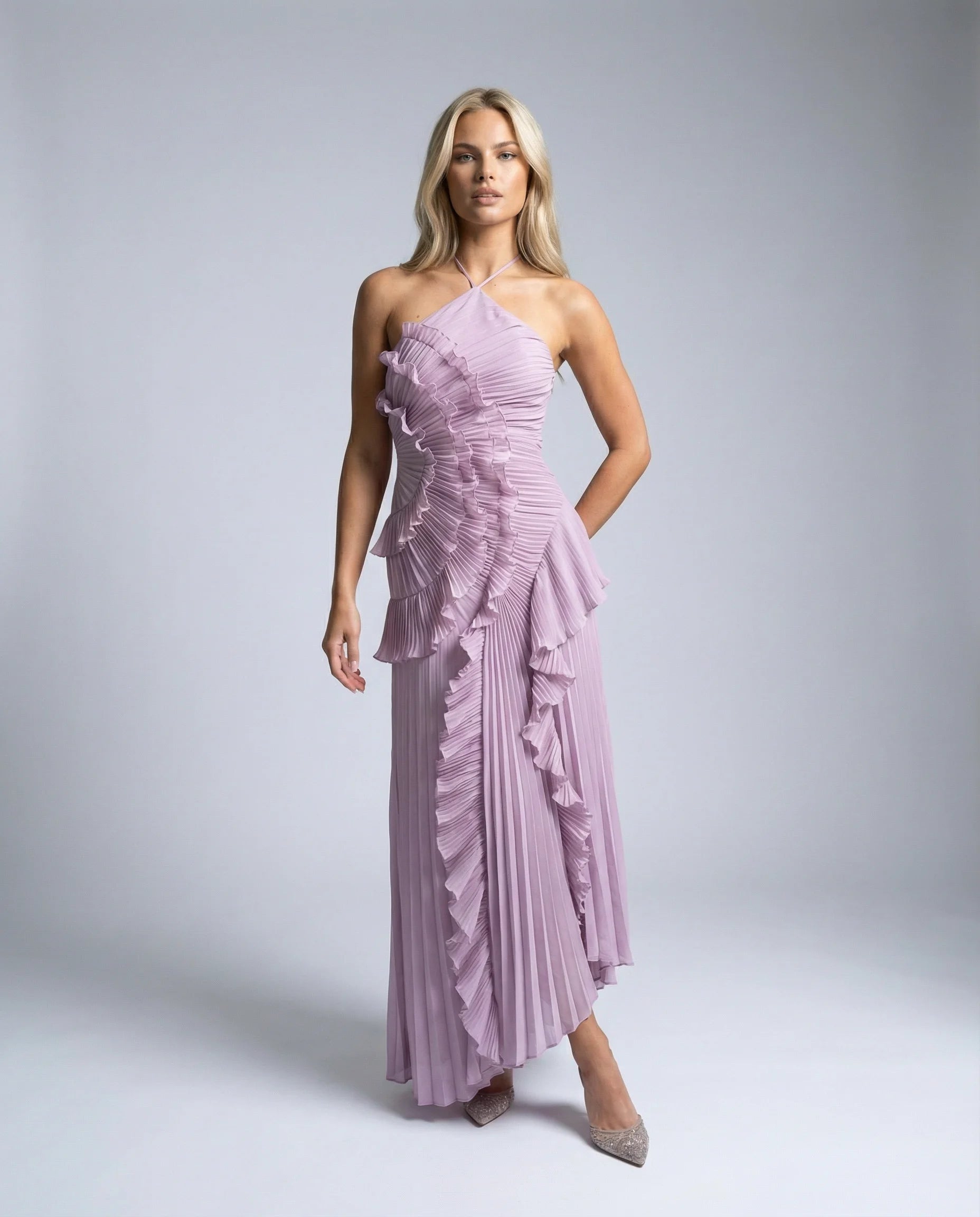 Purple ruffle pleated maxi dress for women by Ilynora, side view showing cascading ruffles and elegant movement