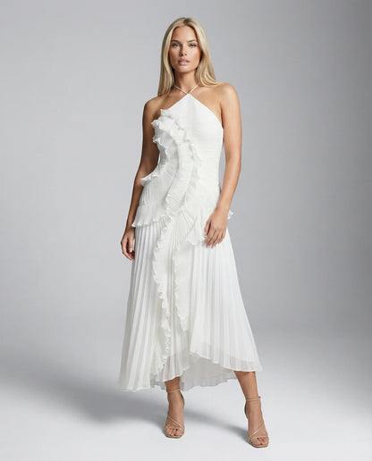 White ruffle pleated maxi dress for women by Ilynora, side view highlighting lightweight fabric and movement