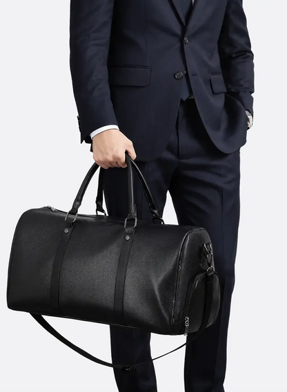 Black all-in-one gym and travel duffel bag with adjustable shoulder strap, spacious design and premium finish by ILYNORA