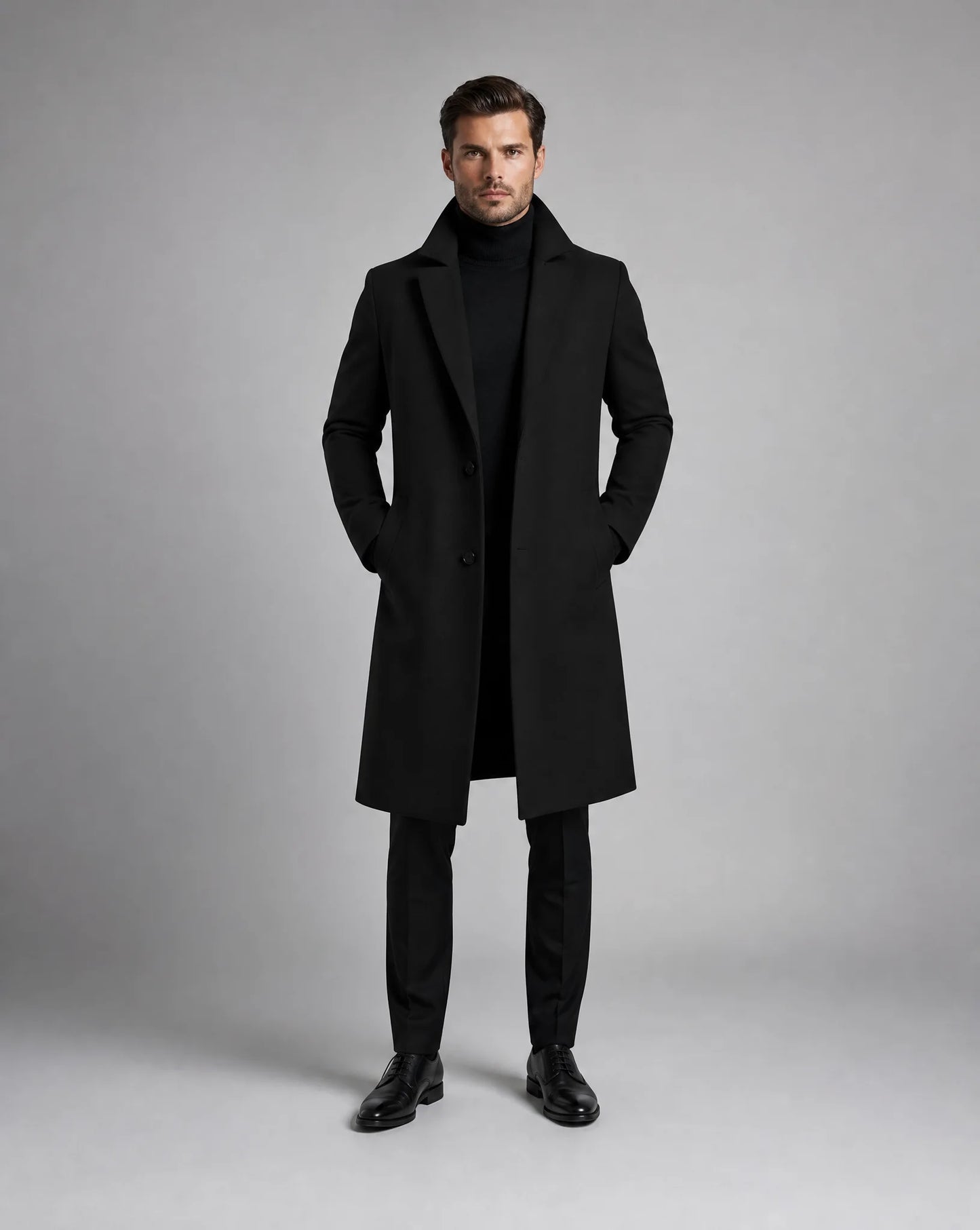 ILYNORA black classic tailored long overcoat front view
