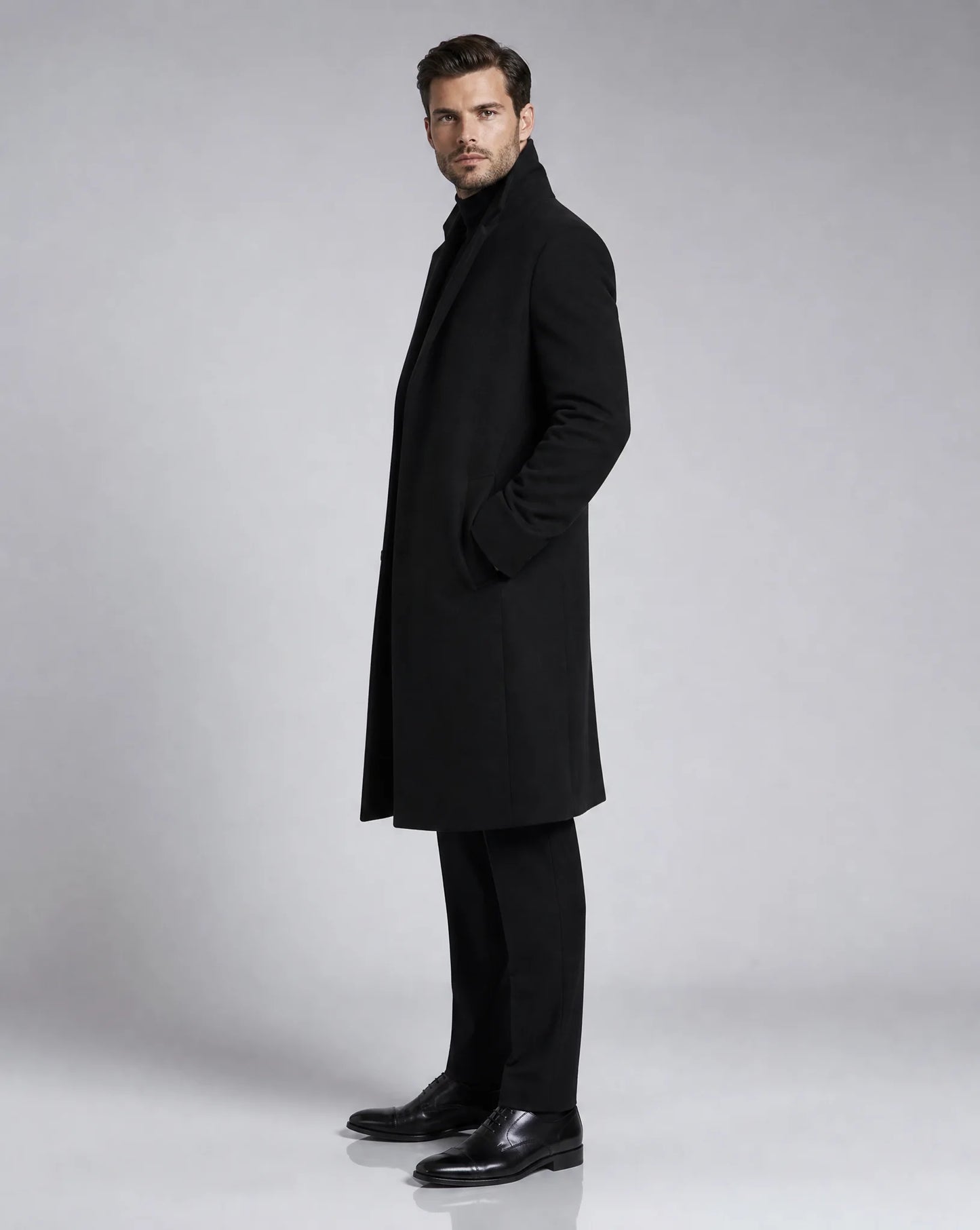 ILYNORA black classic tailored long overcoat side view