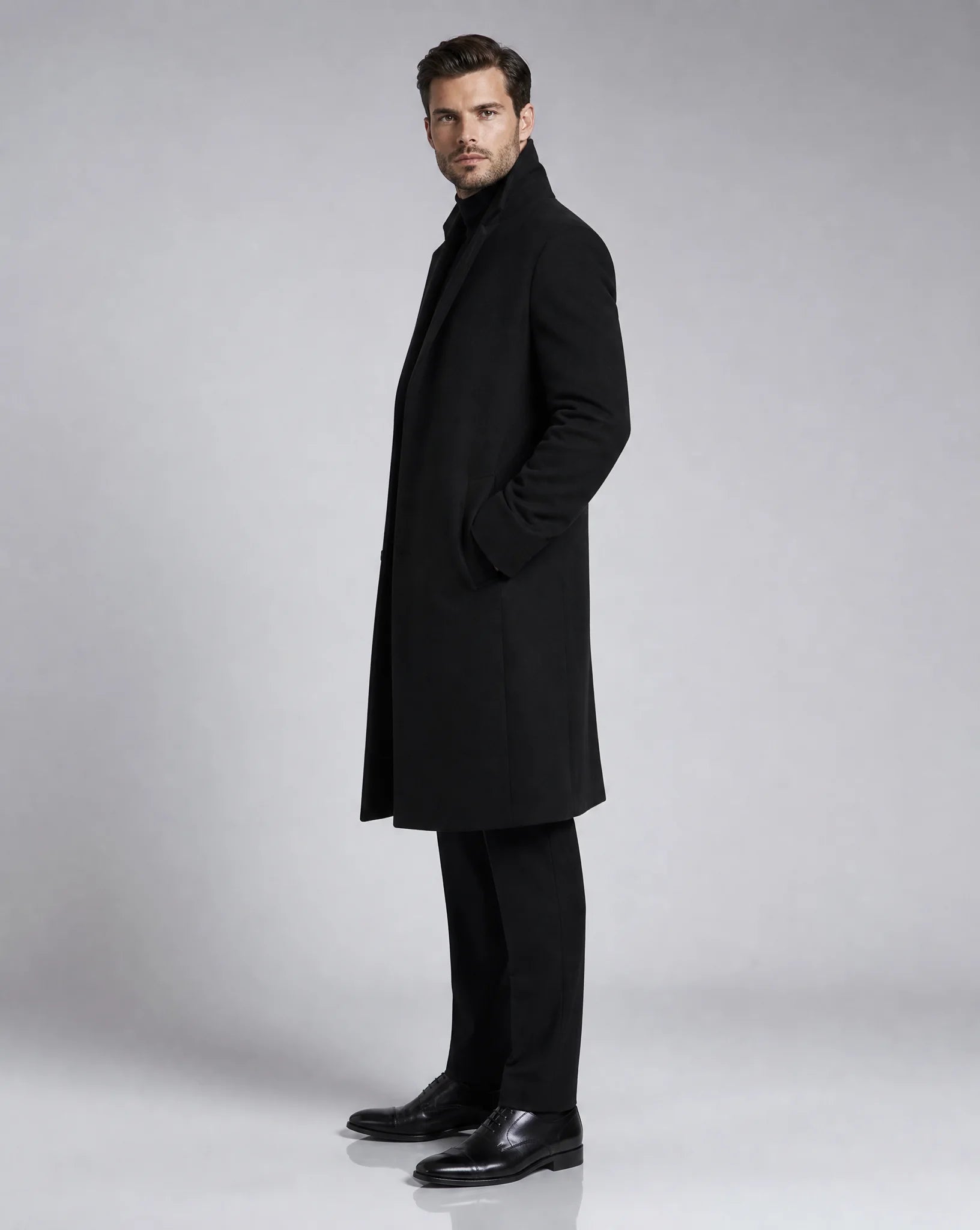 ILYNORA black classic tailored long overcoat side view
