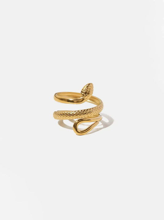 Gold tone adjustable snake ring by Ilynora, front view with sculpted wrap design and polished finish