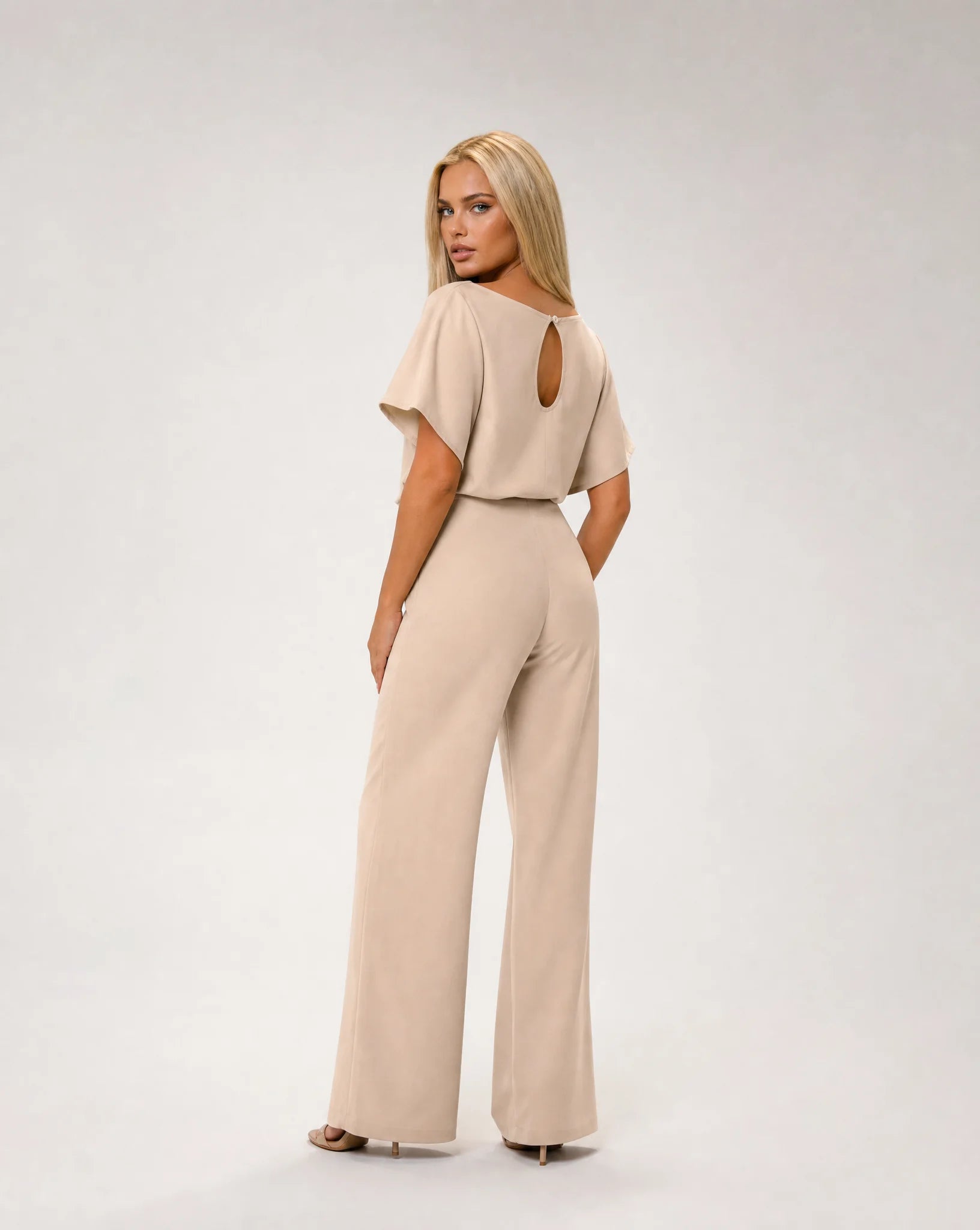 Apricot belted wide leg jumpsuit for women by Ilynora, back view showcasing the flowing silhouette