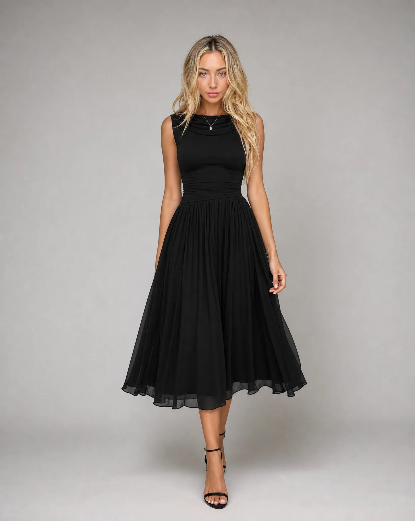 Women's black draped cowl neck pleated midi dress with sleeveless design, flowing pleated skirt and elegant evening silhouette by ILYNORA