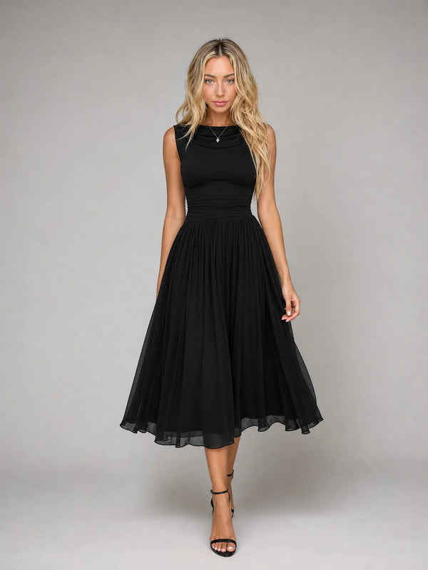 Women's black draped cowl neck pleated midi dress with sleeveless design, flowing pleated skirt and elegant evening silhouette by ILYNORA