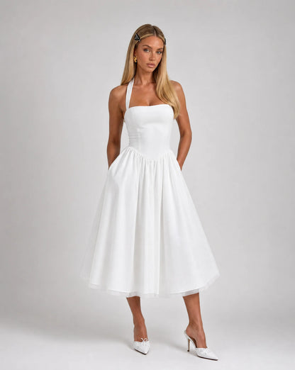 White corset back midi dress for women by Ilynora, front view with elegant silhouette and flowing skirt