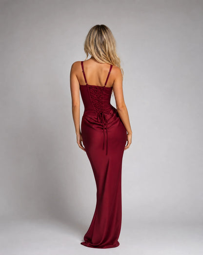 Burgundy corset bodycon maxi dress for women by Ilynora, back view showcasing the fitted shape and lace up back