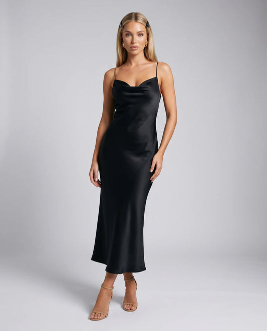 Black cowl neck midi slip dress for women by Ilynora, front view with elegant draped neckline and modern silhouette