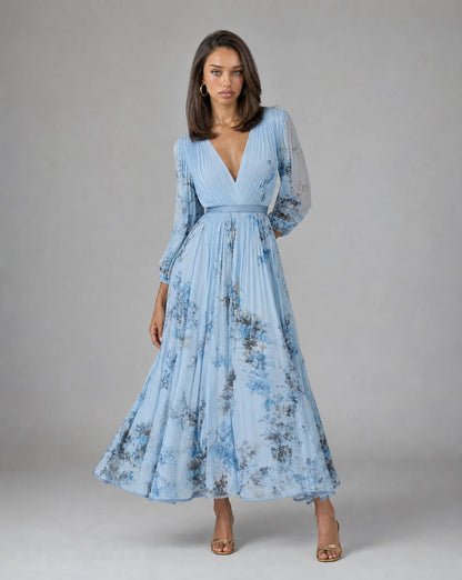 Blue floral V neck maxi dress for women by Ilynora, front view with flowing silhouette and romantic print