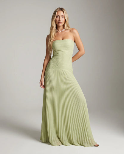 Green strapless pleated maxi dress for women by Ilynora, full length view with airy pleated skirt