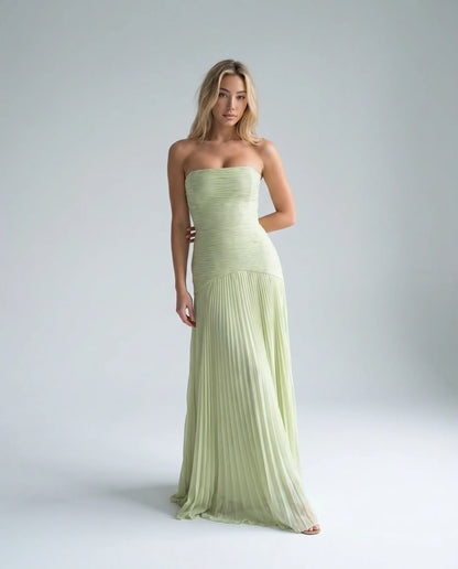 Green strapless pleated maxi dress for women by Ilynora, front view with flowing silhouette and elegant draping