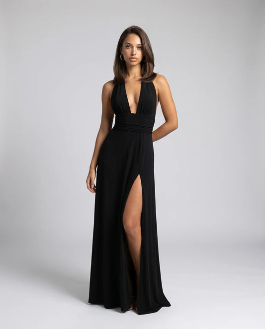Black halter neck split maxi dress for women by Ilynora, front view with plunging neckline and side slit