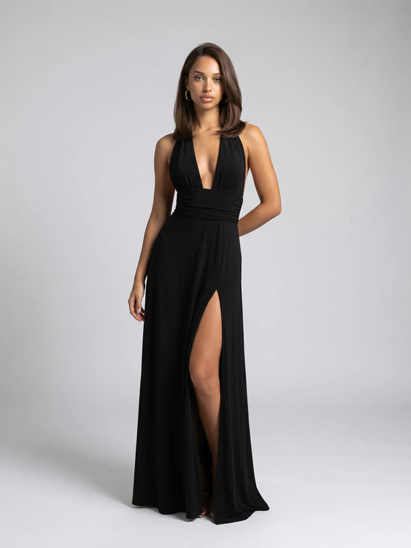 Black halter neck split maxi dress for women by Ilynora, front view with plunging neckline and side slit
