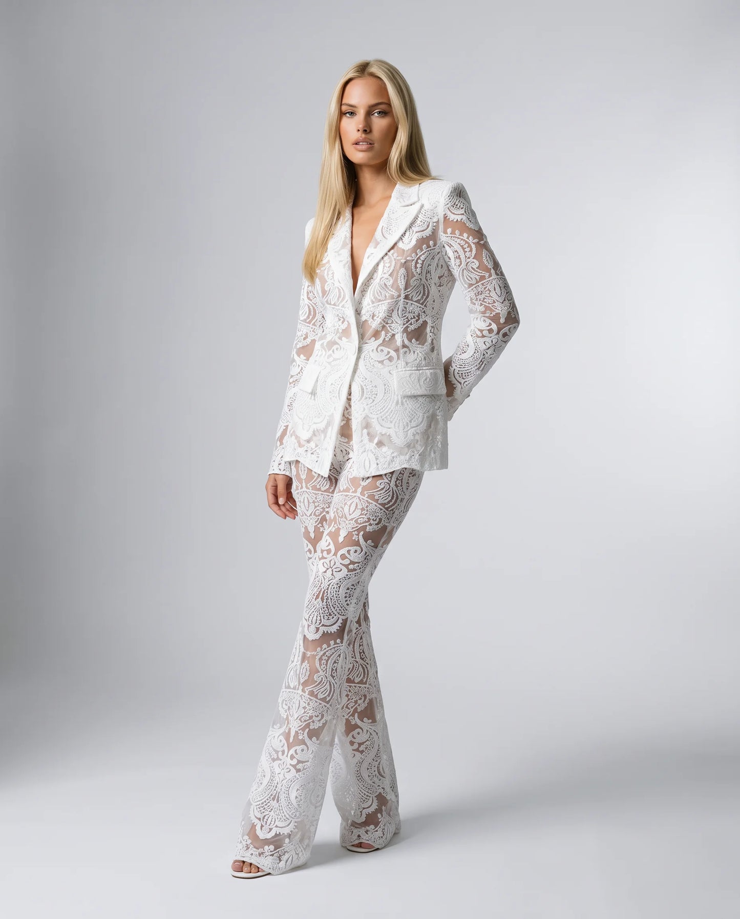 White lace blazer co ord set for women by Ilynora, side view highlighting the elegant fit and lace design