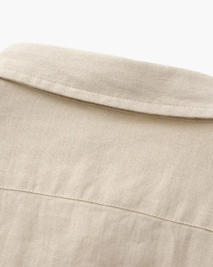 100% linen shirt in beige by Ilynora, close-up showing natural fabric texture and premium feel