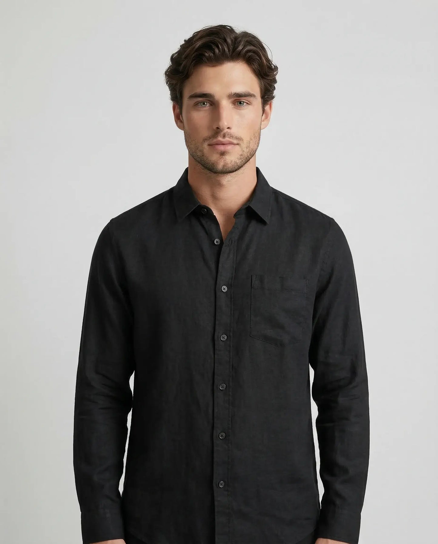 Black 100% linen resort shirt by Ilynora, front view with clean silhouette and breathable material