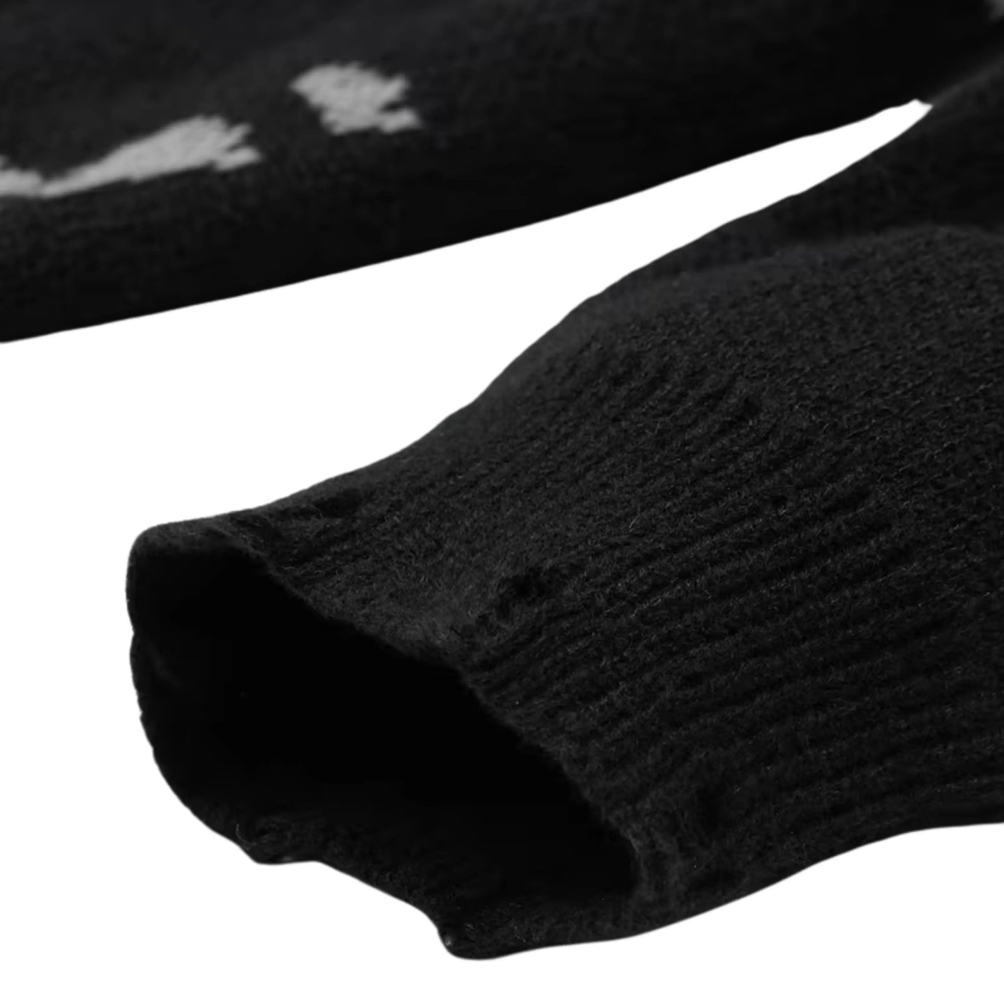 Abstract knit sweater in black by Ilynora, angled view highlighting unique pattern and silhouette