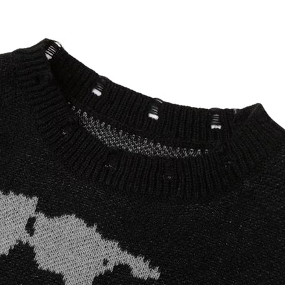 Abstract pattern sweater in black by Ilynora, close-up showing textured knit and detailed design