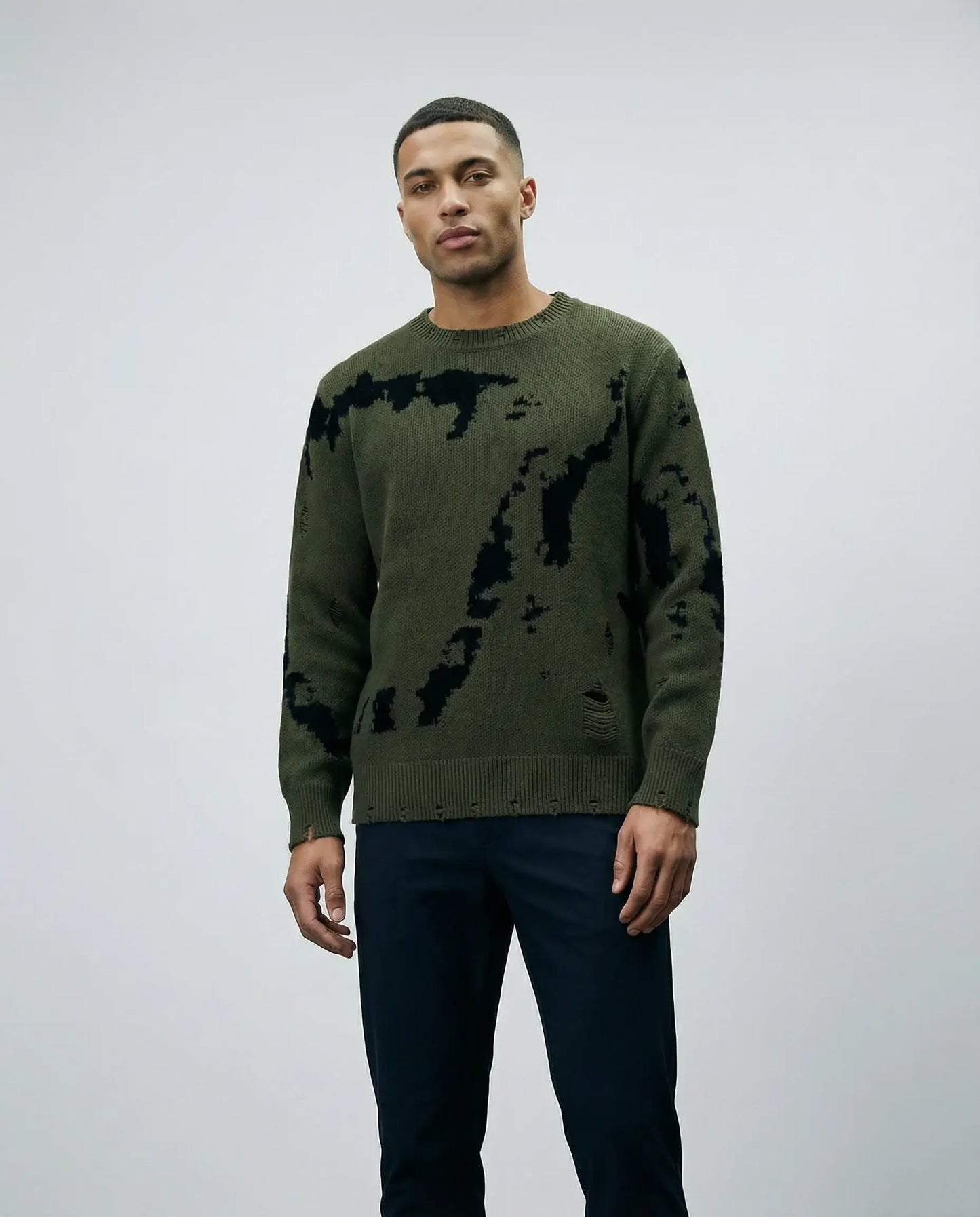 Green abstract pattern knit crewneck sweater by Ilynora, front view with soft knit and modern silhouette