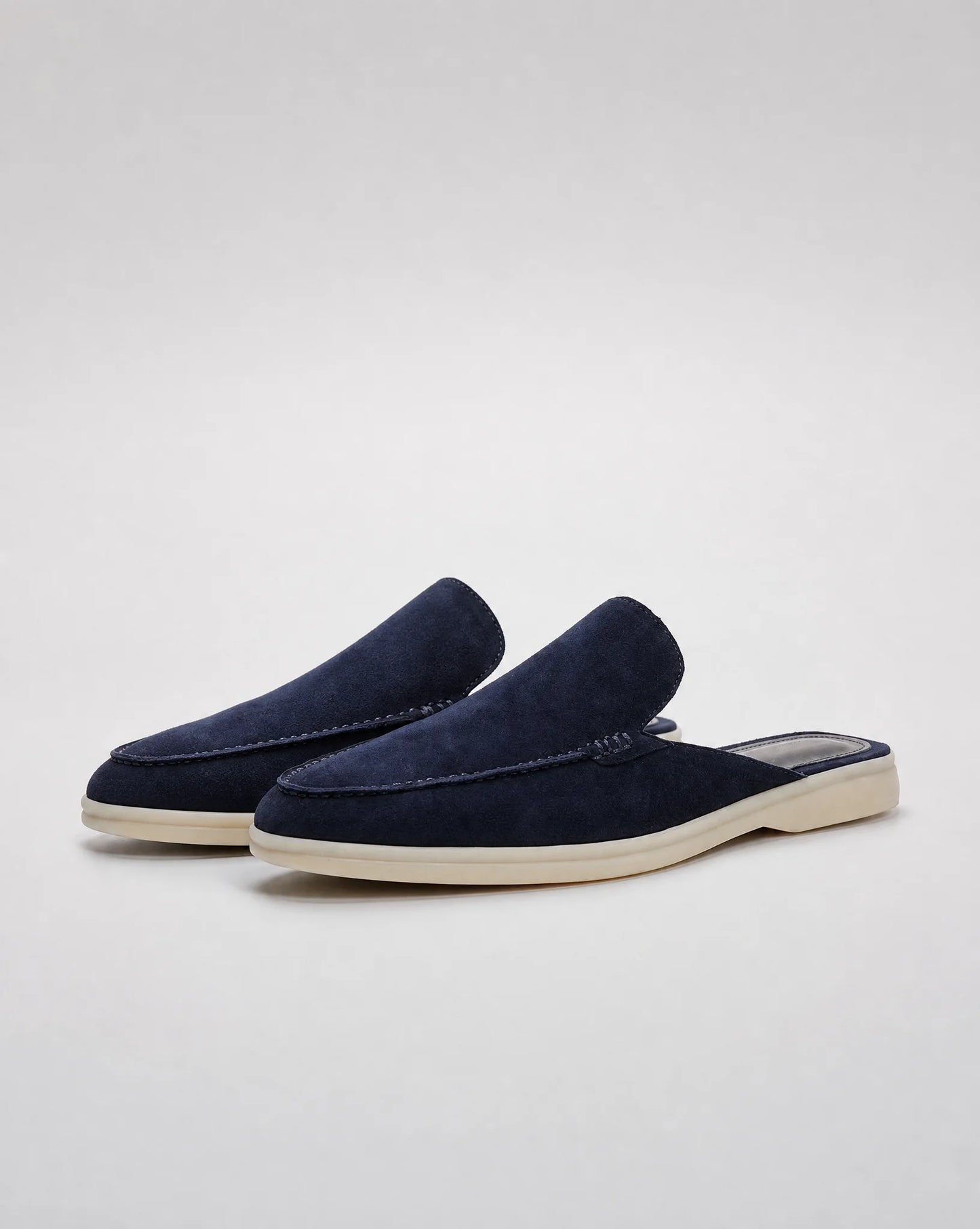 Men's dark blue suede loafers with backless silhouette and smart casual appeal by ILYNORA