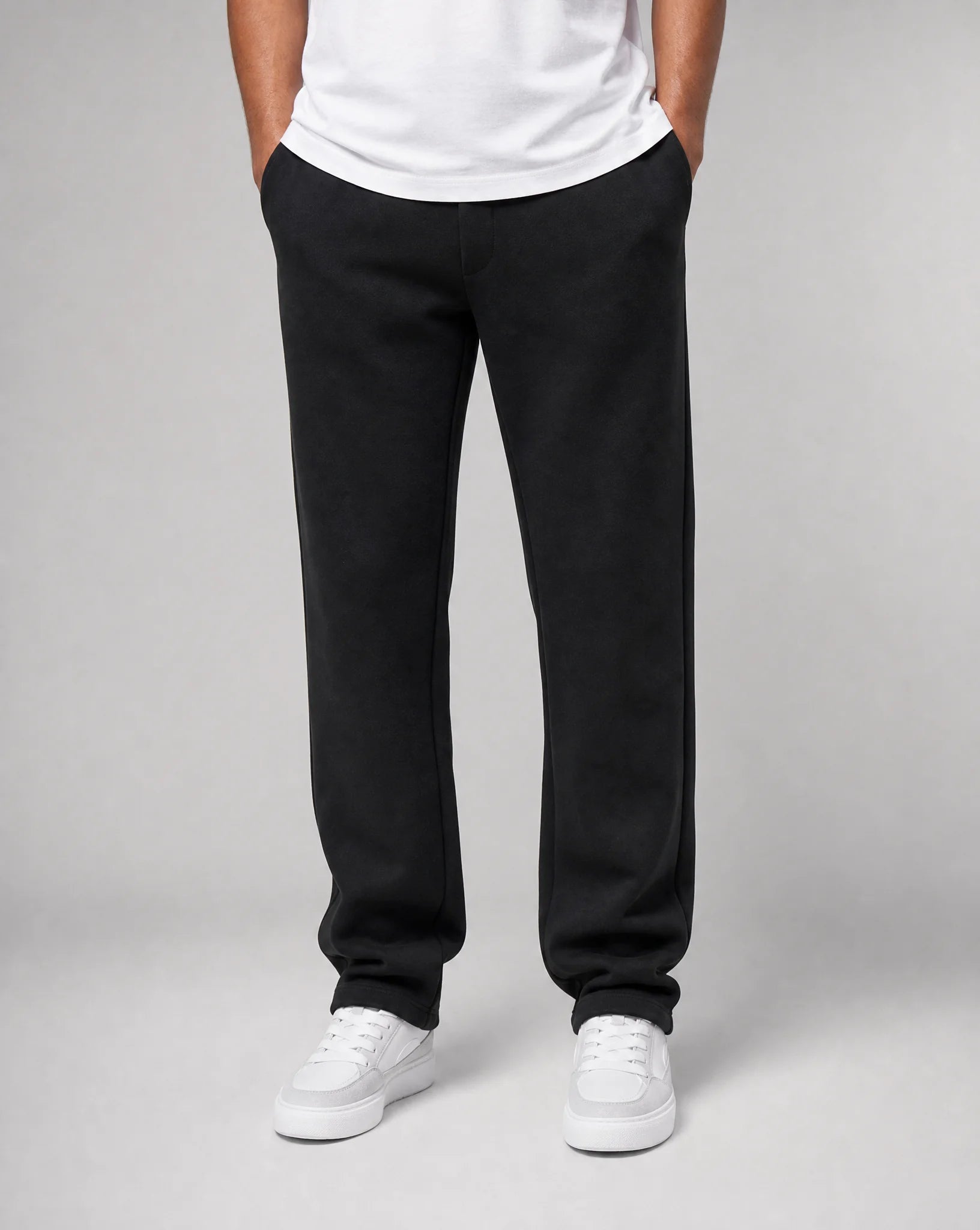 Men's black relaxed fit open hem joggers with heavyweight brushed fleece cotton and elastic waistband by ILYNORA