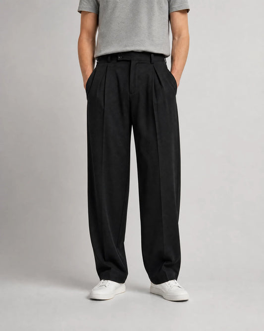 Men's black wide leg pleated tailored trousers with high waist, double front pleats and relaxed smart-casual fit by ILYNORA