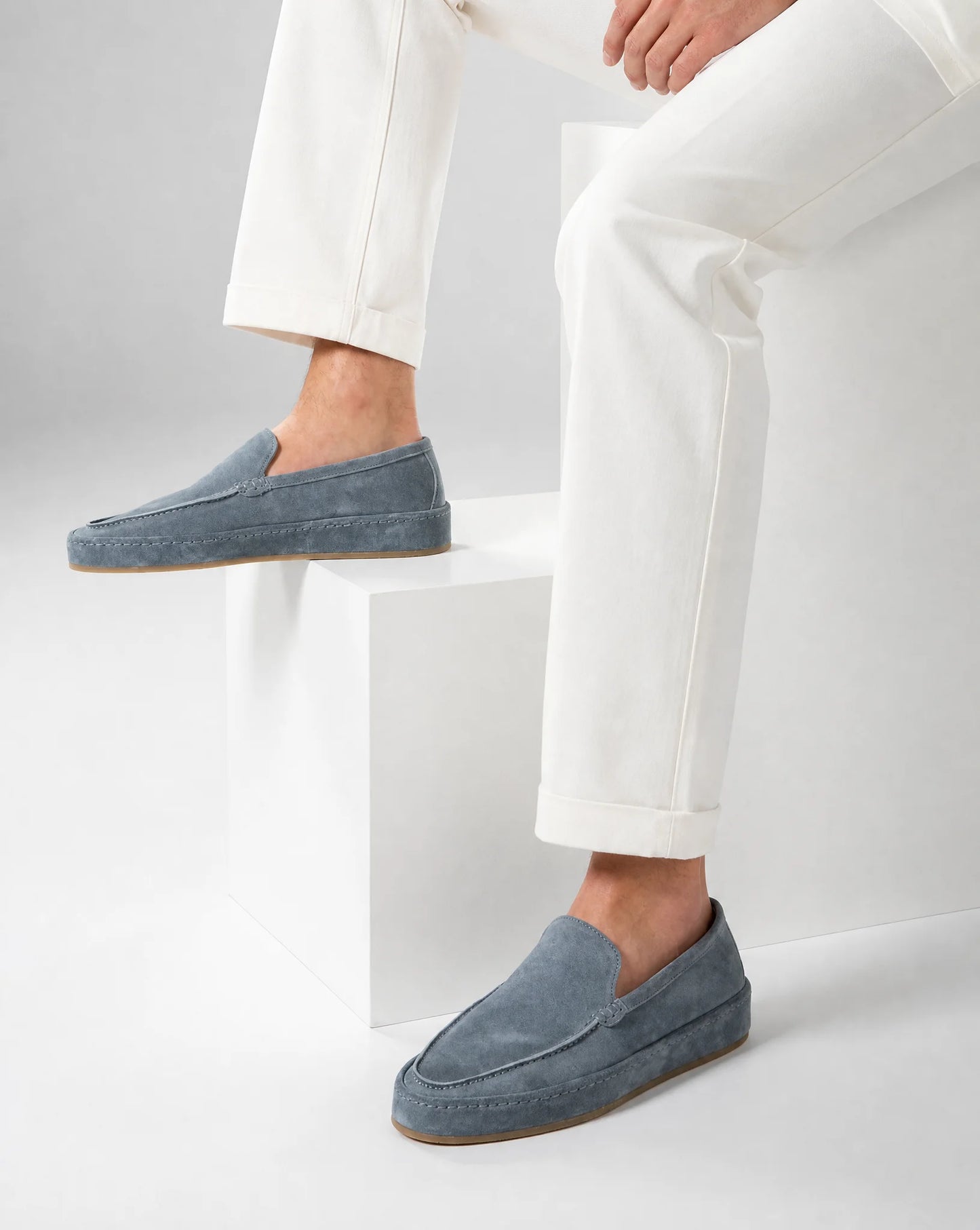 Men's light blue suede loafers with modern slip on design and relaxed elegant appeal by ILYNORA