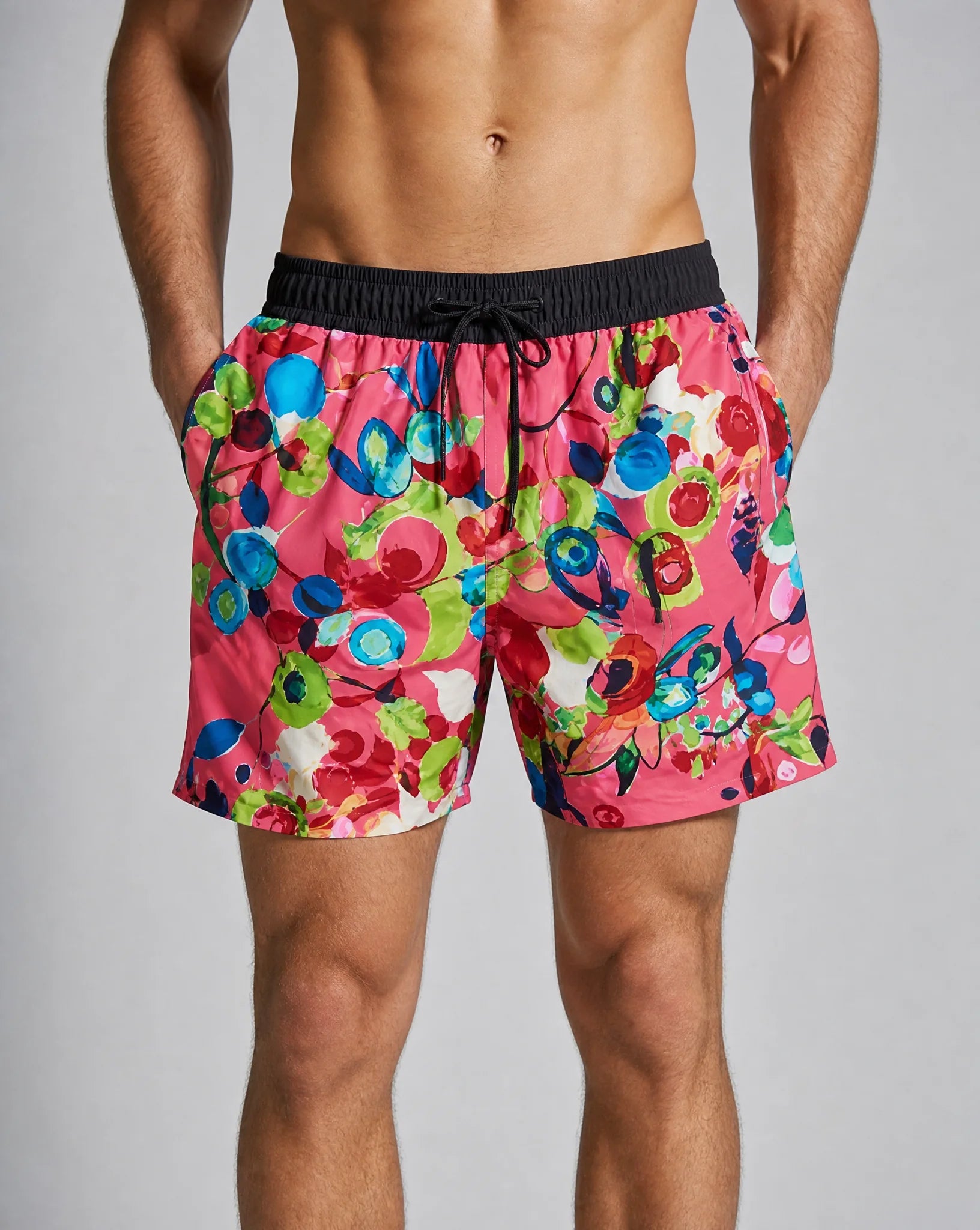 Men's tropical red leaf swim shorts with quick dry fabric and compression liner by ILYNORA