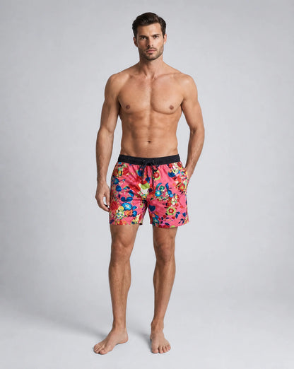 Men's carmine red leaf print swim shorts with supportive compression liner by ILYNORA