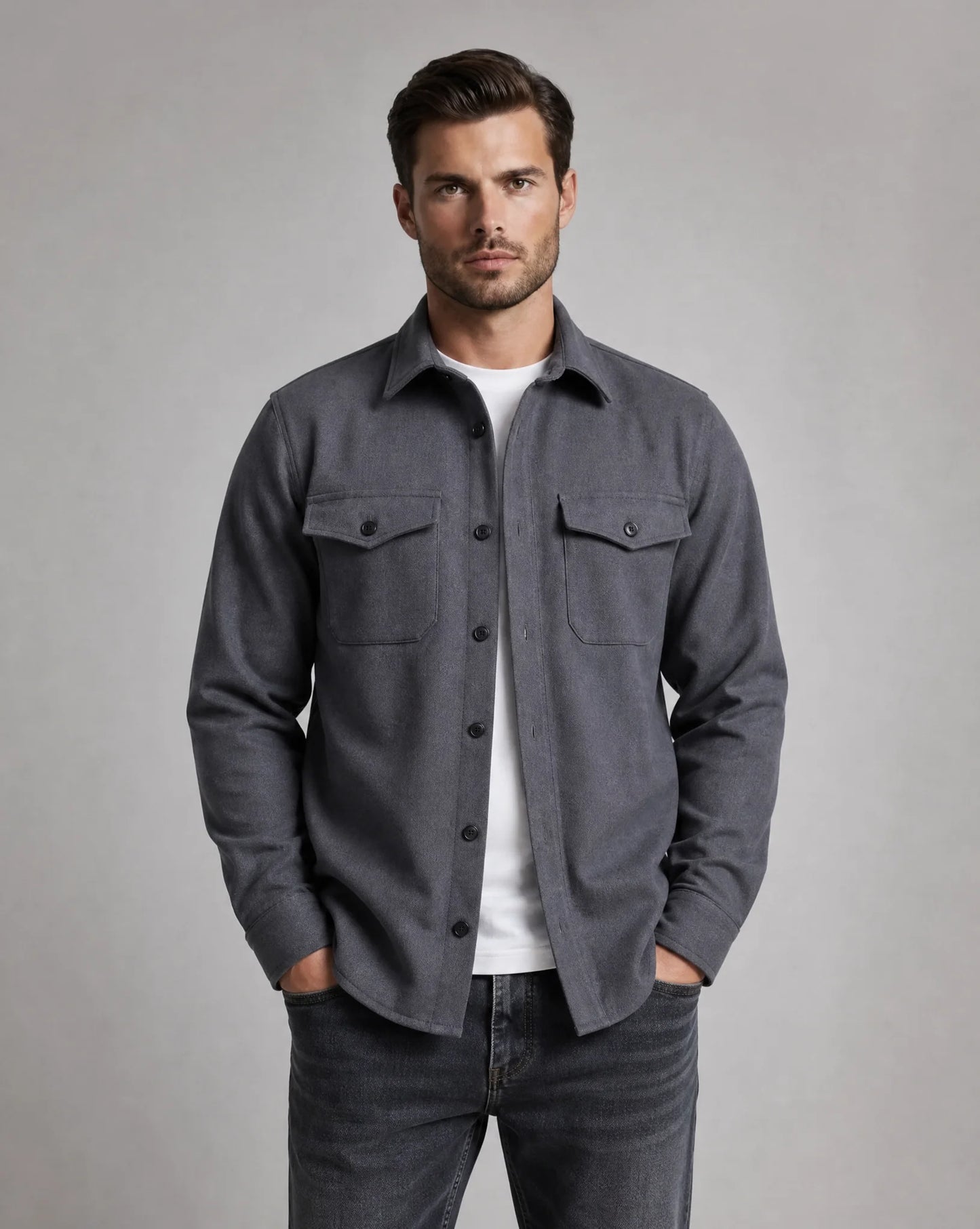 Men's dark grey overshirt jacket with chest pockets, button closure, lightweight fabric and modern relaxed fit by ILYNORA