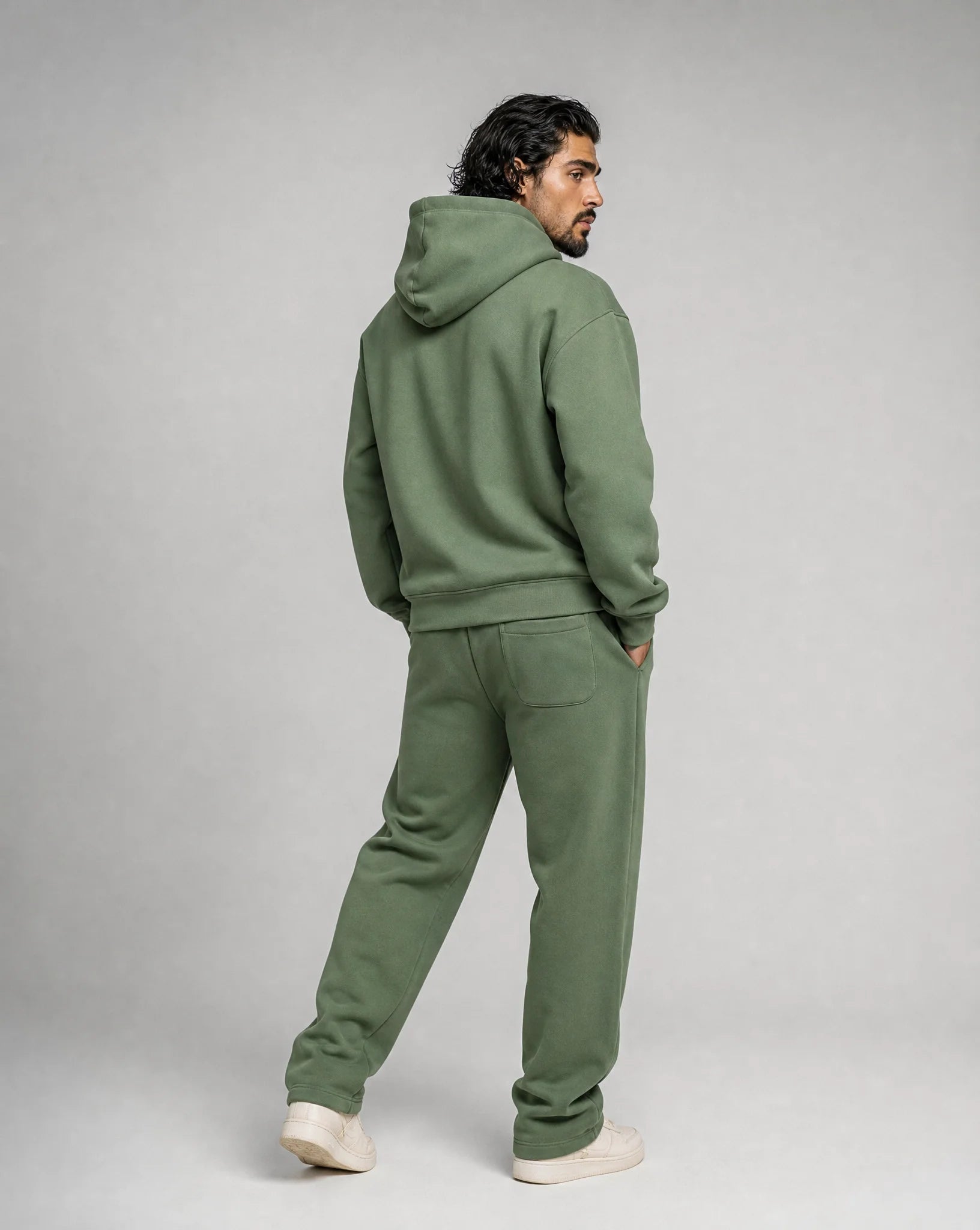 Green oversized hoodie and jogger set for men by Ilynora, back view with casual oversized styling