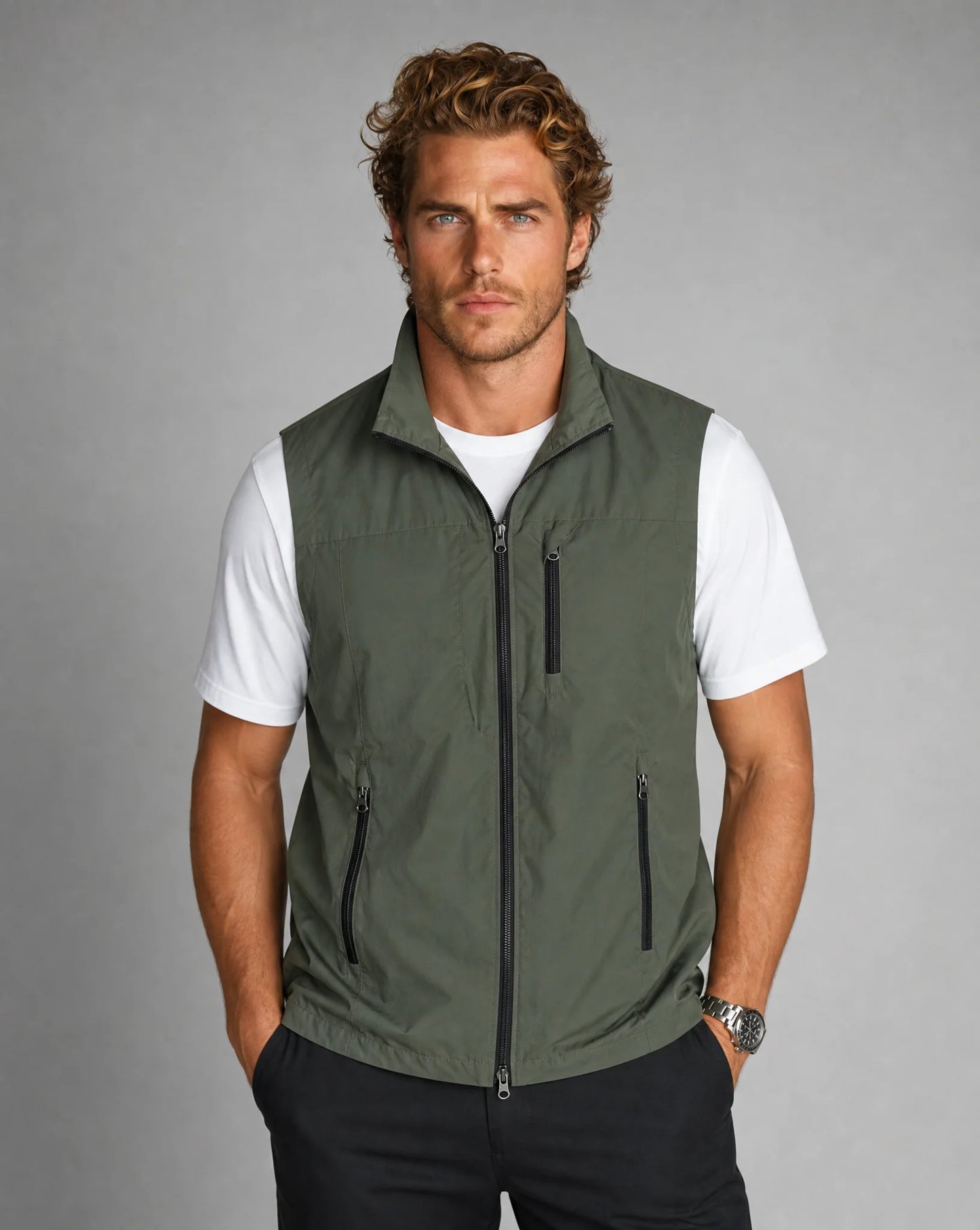 Men's green lightweight utility gilet vest with zip pockets and versatile outdoor style by ILYNORA