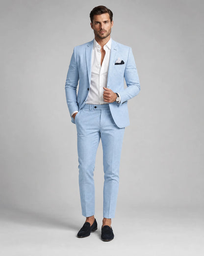 Sky blue linen summer wedding suit with slim fit silhouette and modern formalwear styling by ILYNORA
